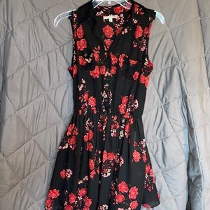 Black with floral accents. Very chic and cute.